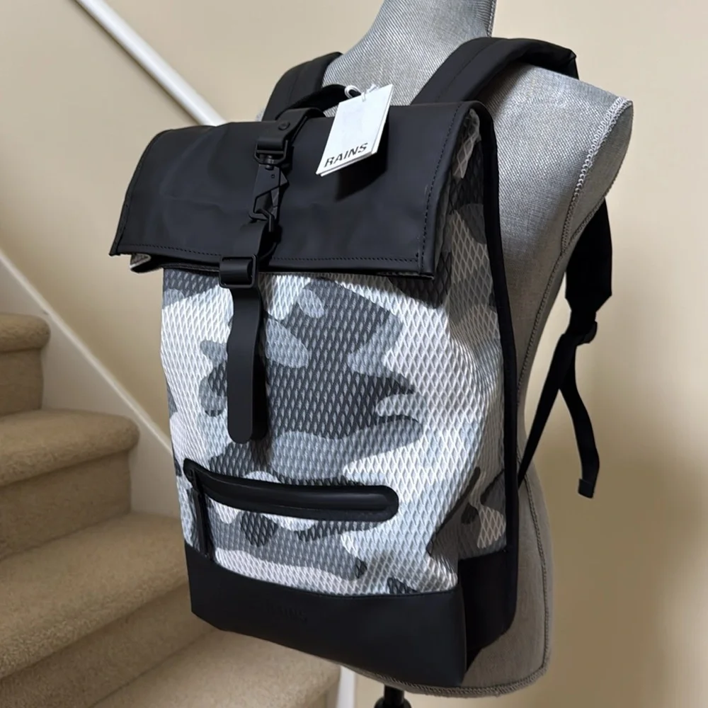New Rains Black and Gray Unisex camo look Backpack.